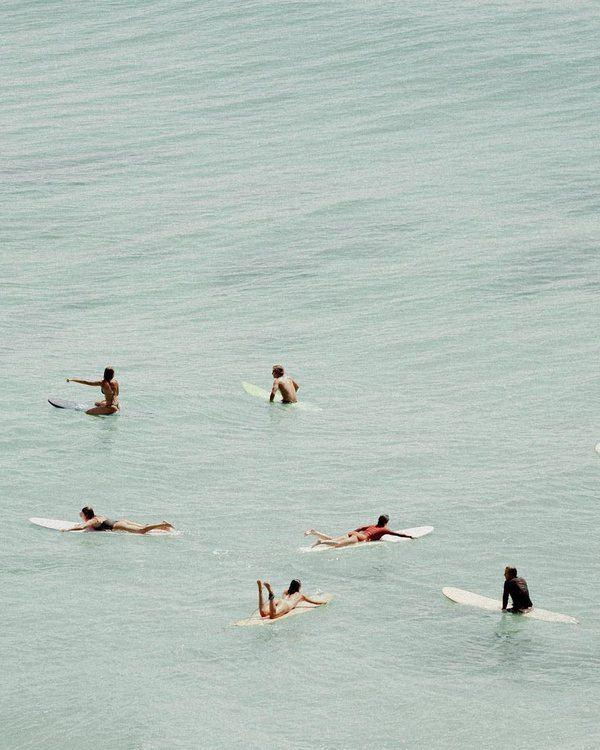 Group waiting for waves in the ocean