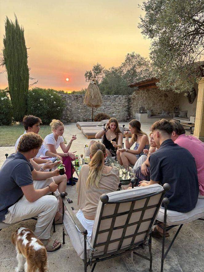 Dinner in the villa garden at sunset